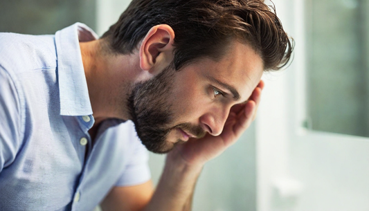 man worries about hair loss