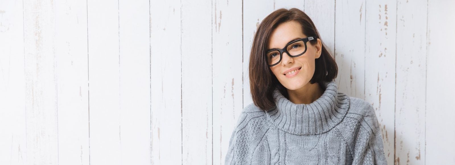 woman with glasses sporting a chin-length bobs hairstyle